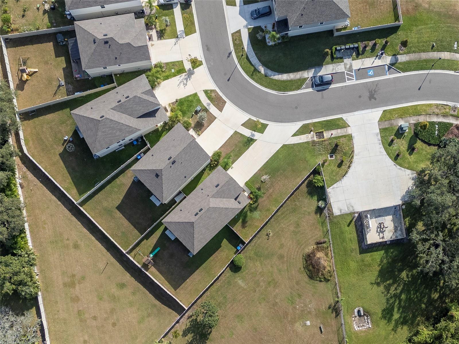 Aerial view of home and community.
