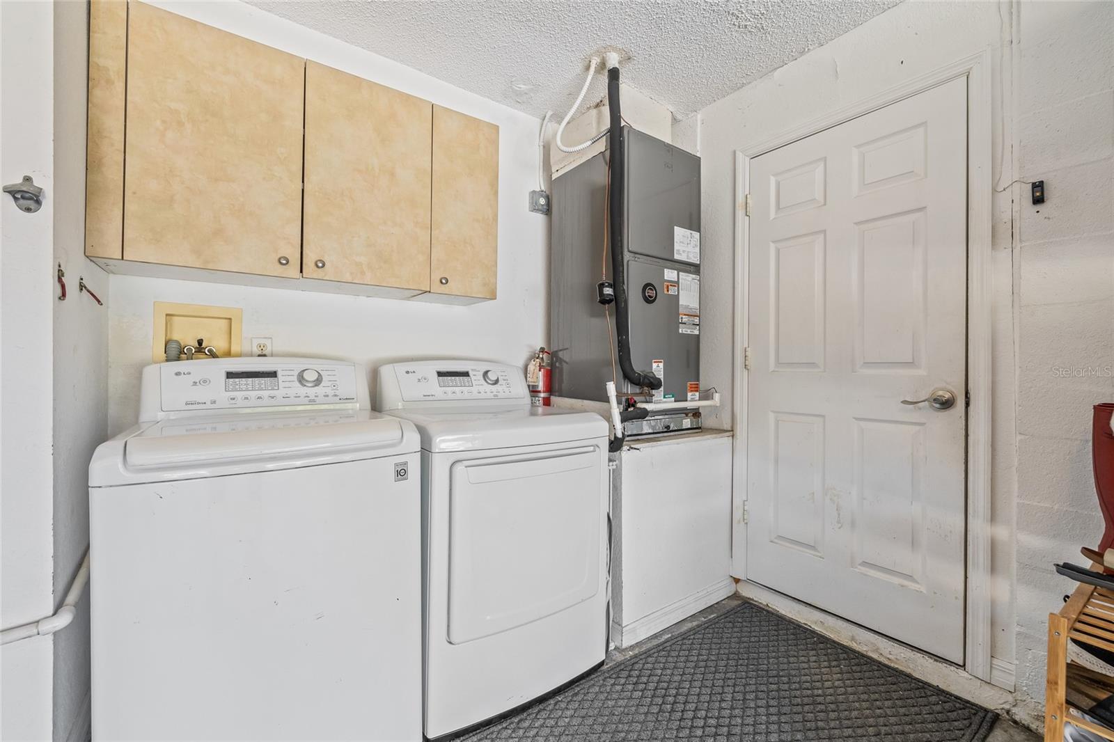 Laundry located in the garage.