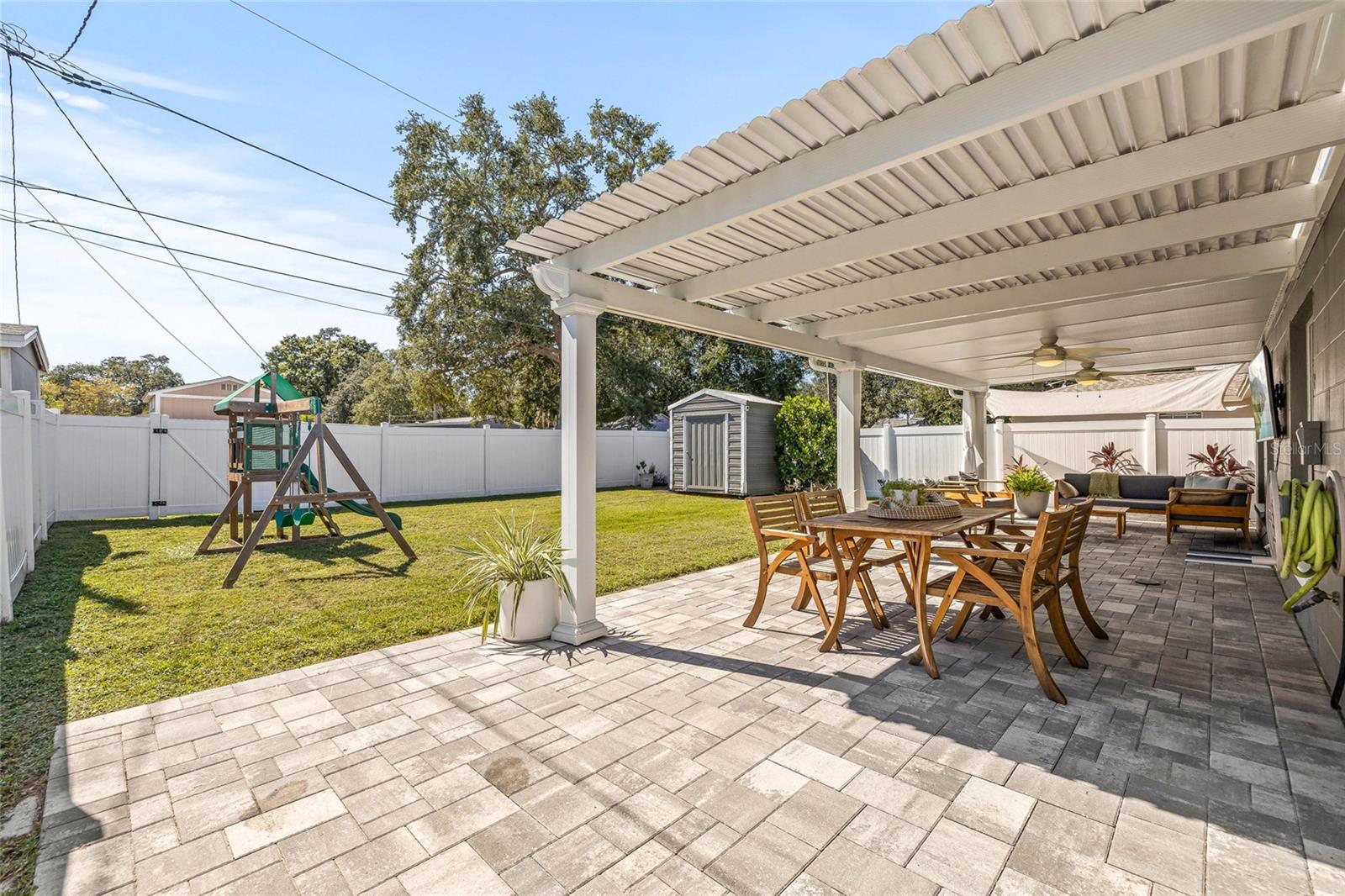 Custom covered porch can be converted into a sunroom for additional, enclosed living space.