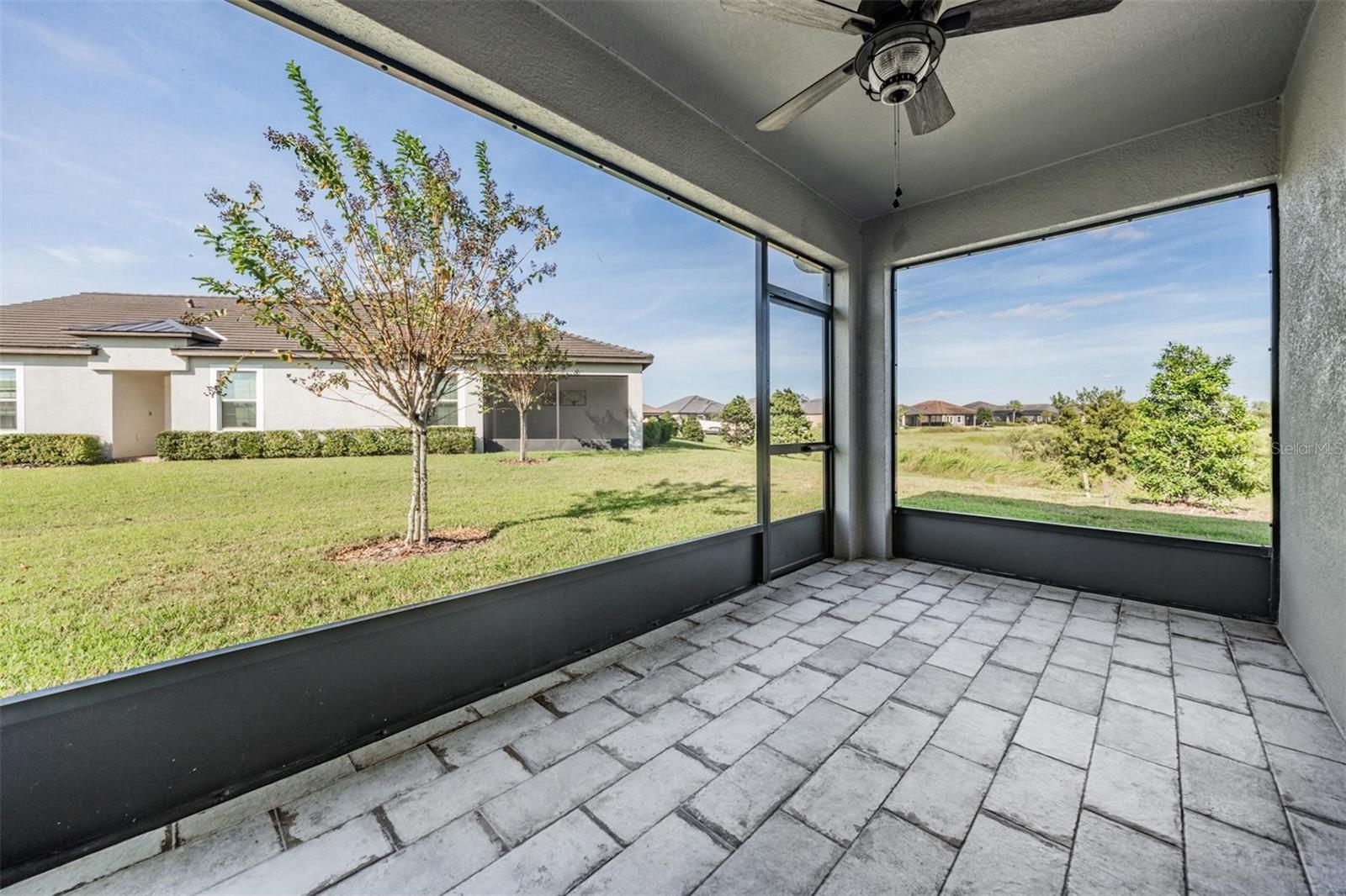 lanai is fully screened w/door and tile floor