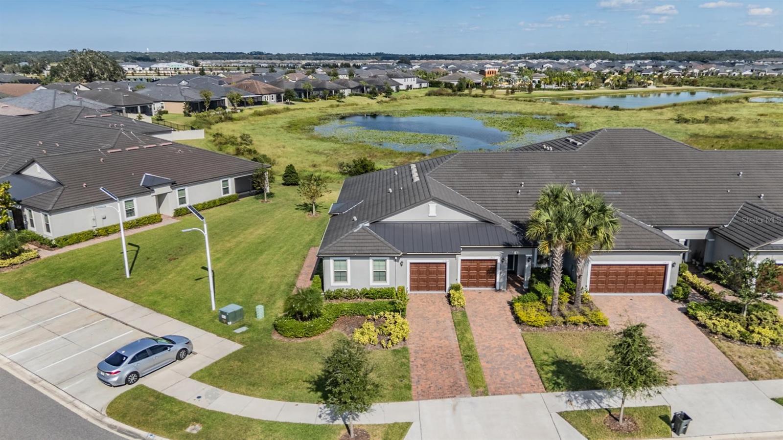 Additional parking and large green space between villas!