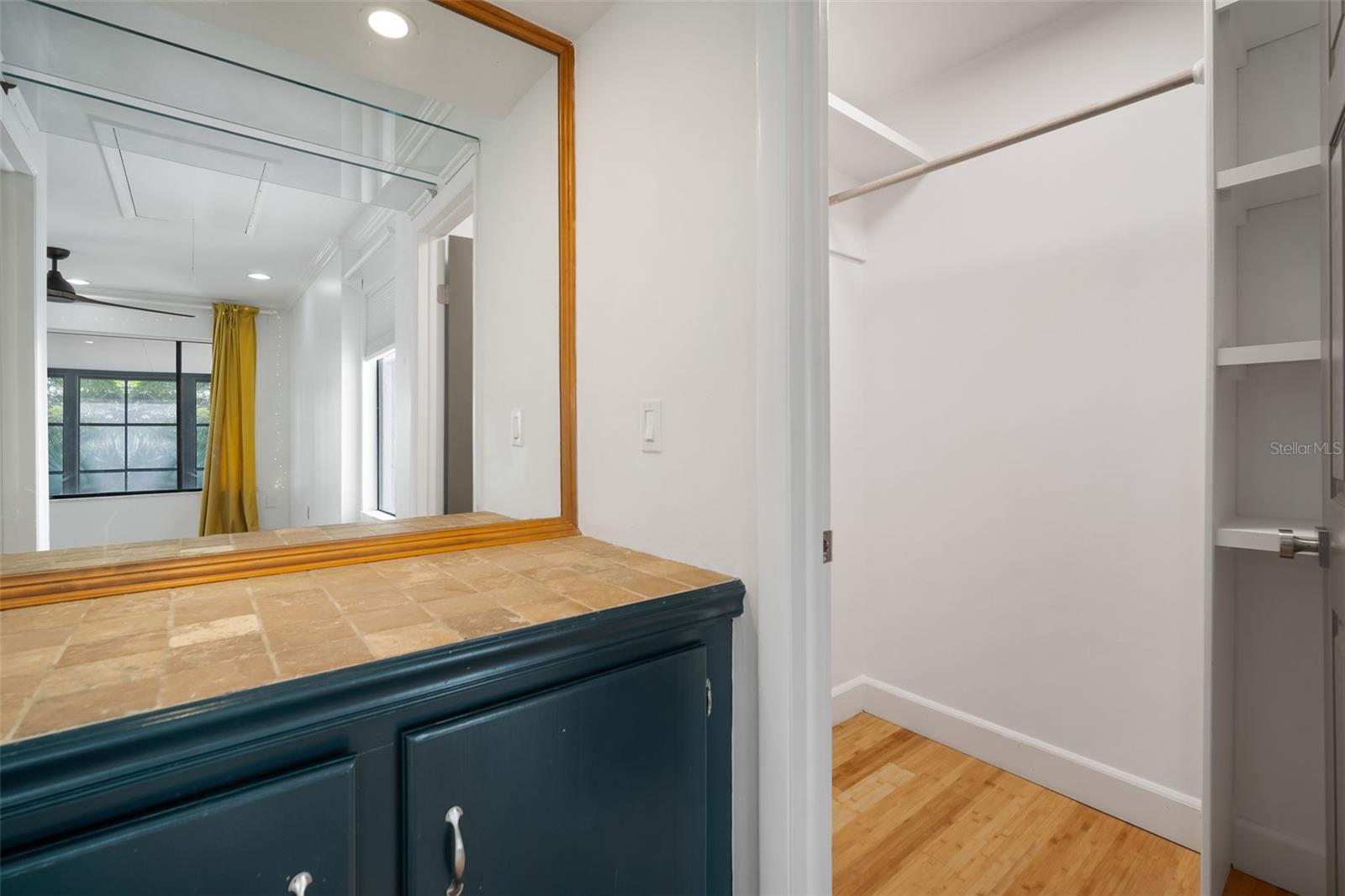primary vanity area/closet