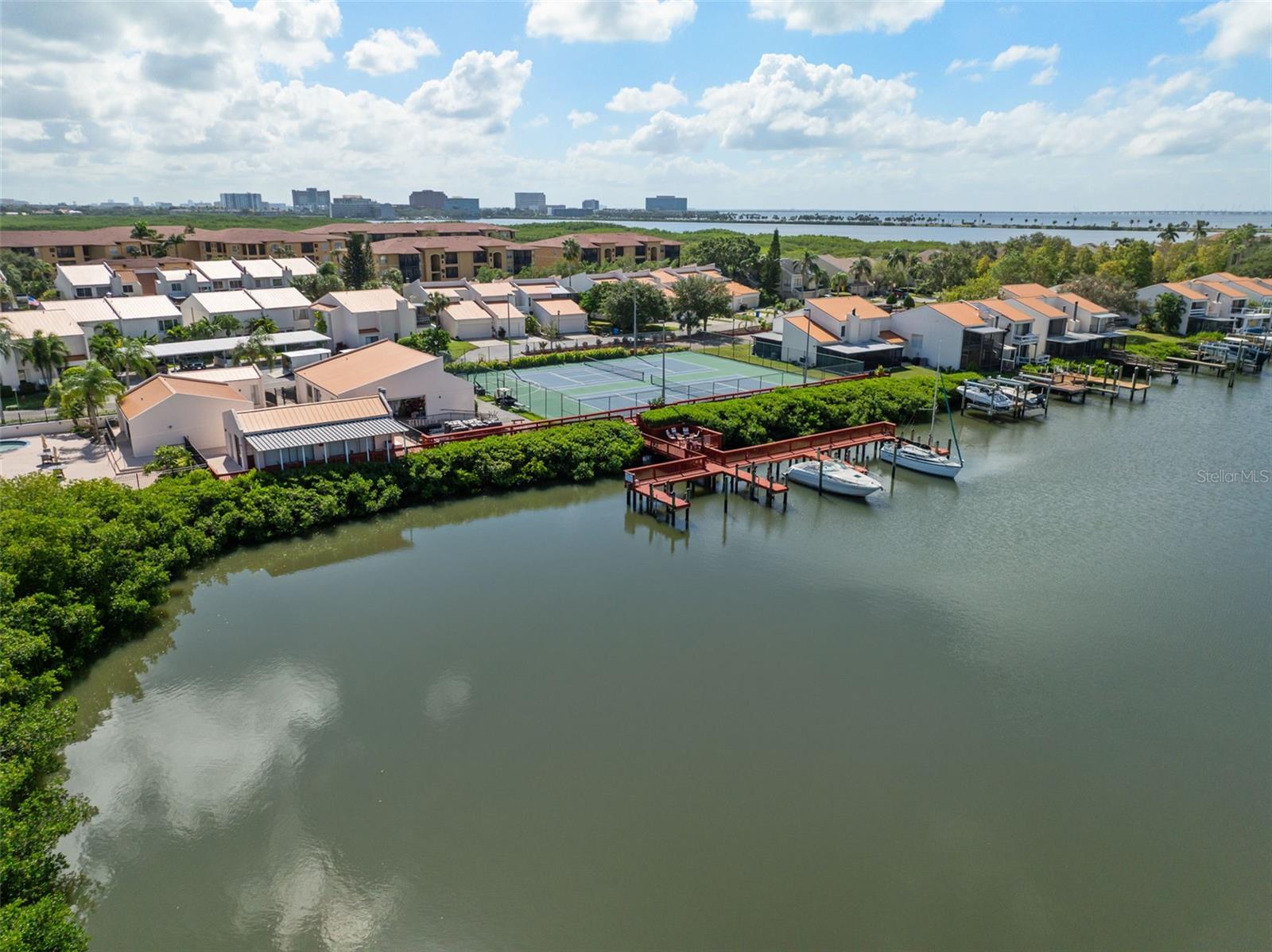 aerial view of marina/tennis court/marina/club house