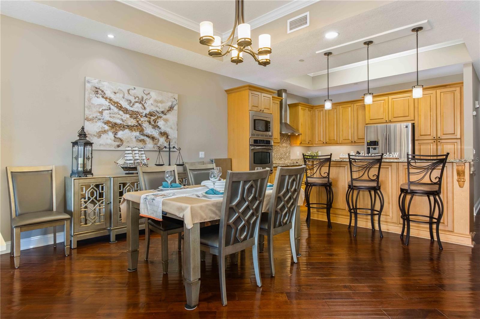 DINING AREA IN BETWEEN LIVING AND KITCHEN