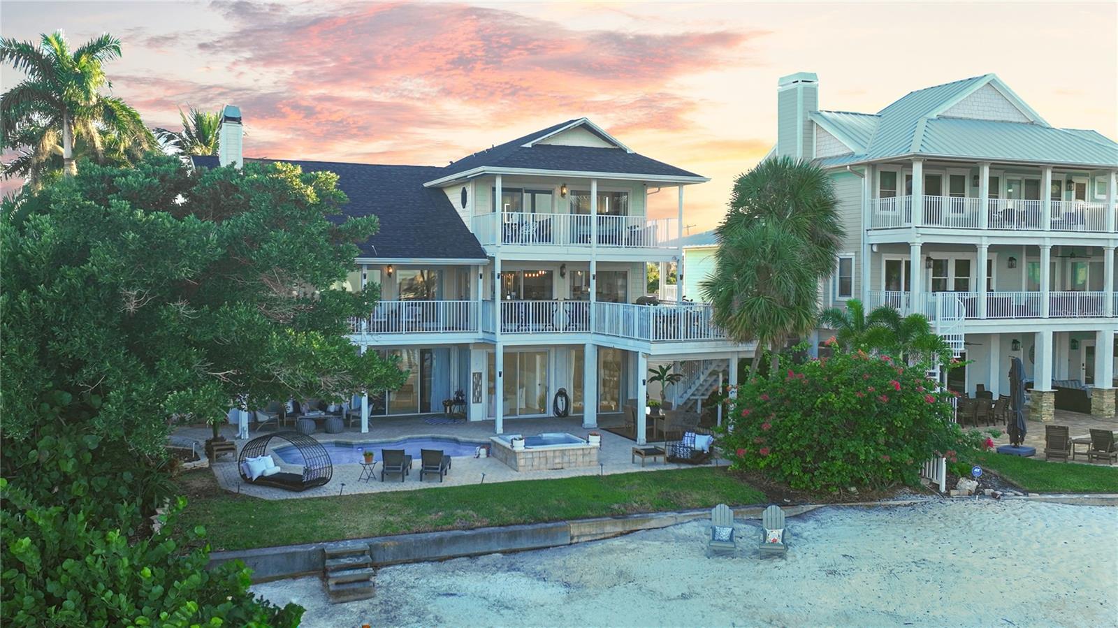 Private sandy beach on Boca Ciega Bay – your backyard paradise.