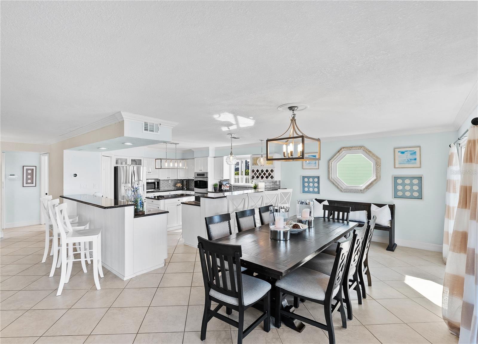 Spacious dining area with water views.