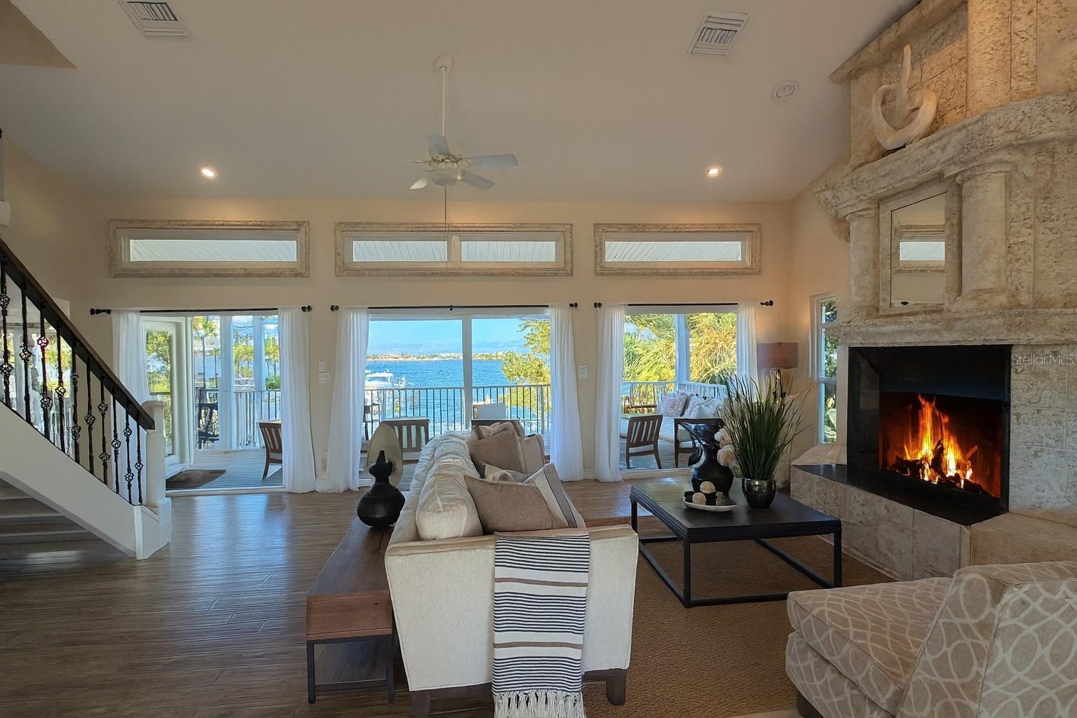 Two-story stone fireplace — stunning focal point of the home.