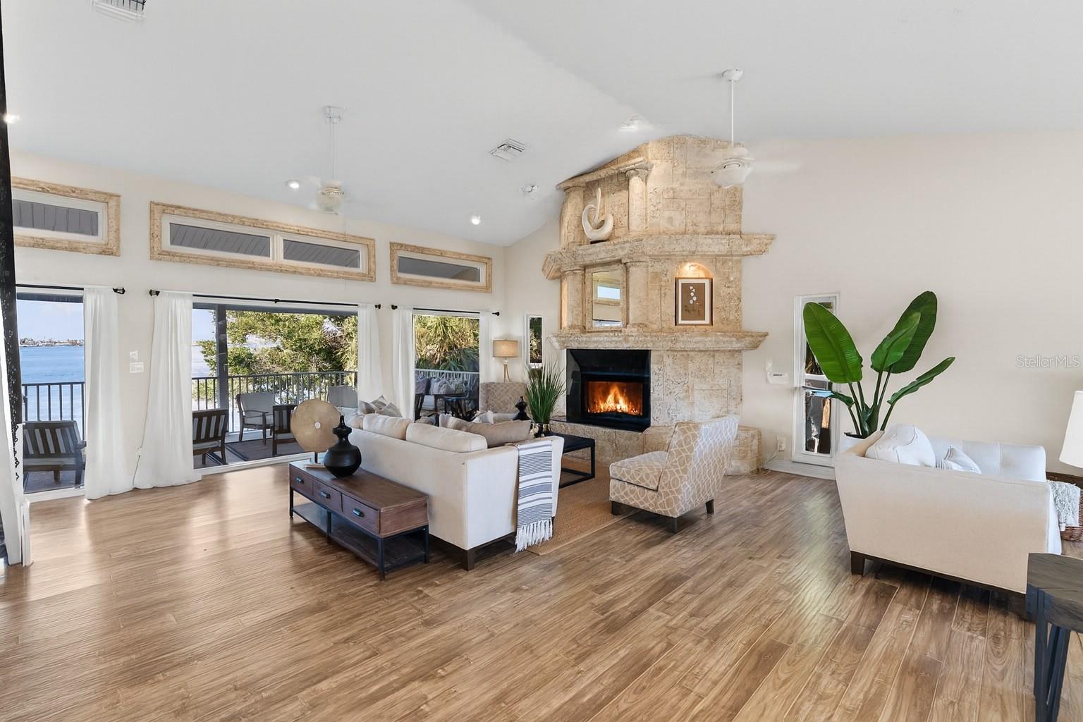 Floor-to-ceiling windows bring the bay right inside.