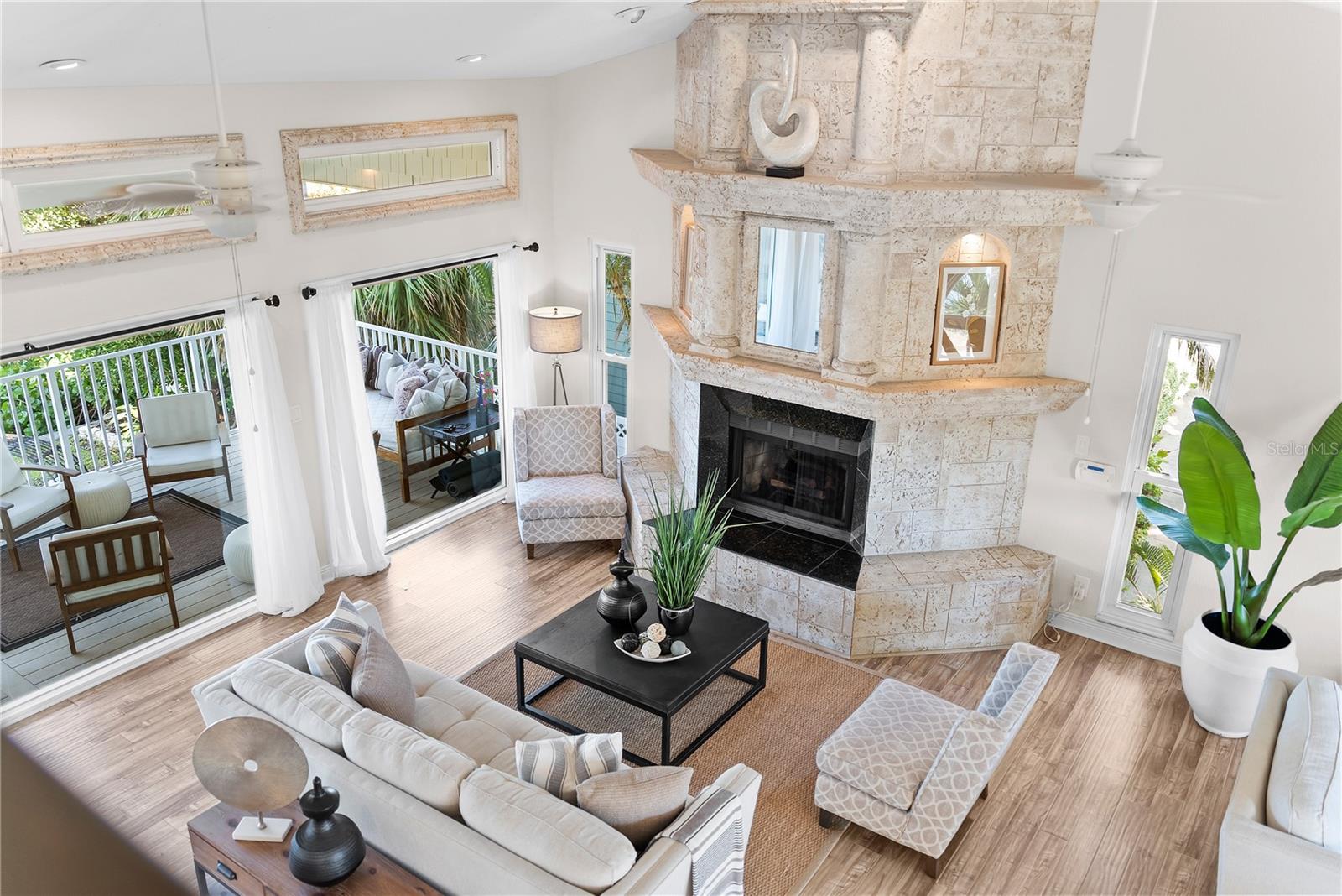 Open-concept great room with soaring 20-foot ceilings