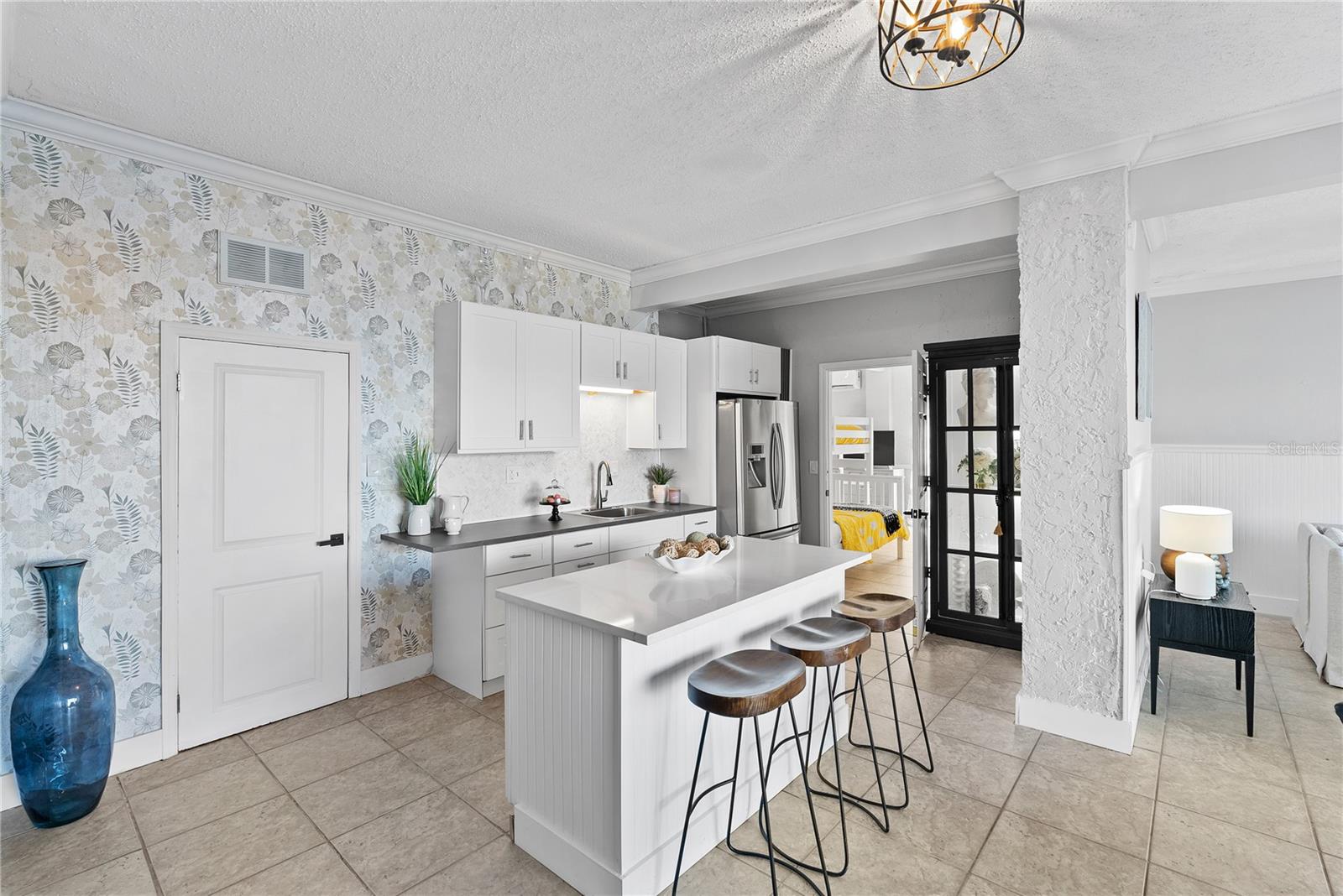 kitchenette — ideal for entertaining or multi-generational living. Quartz countertops.