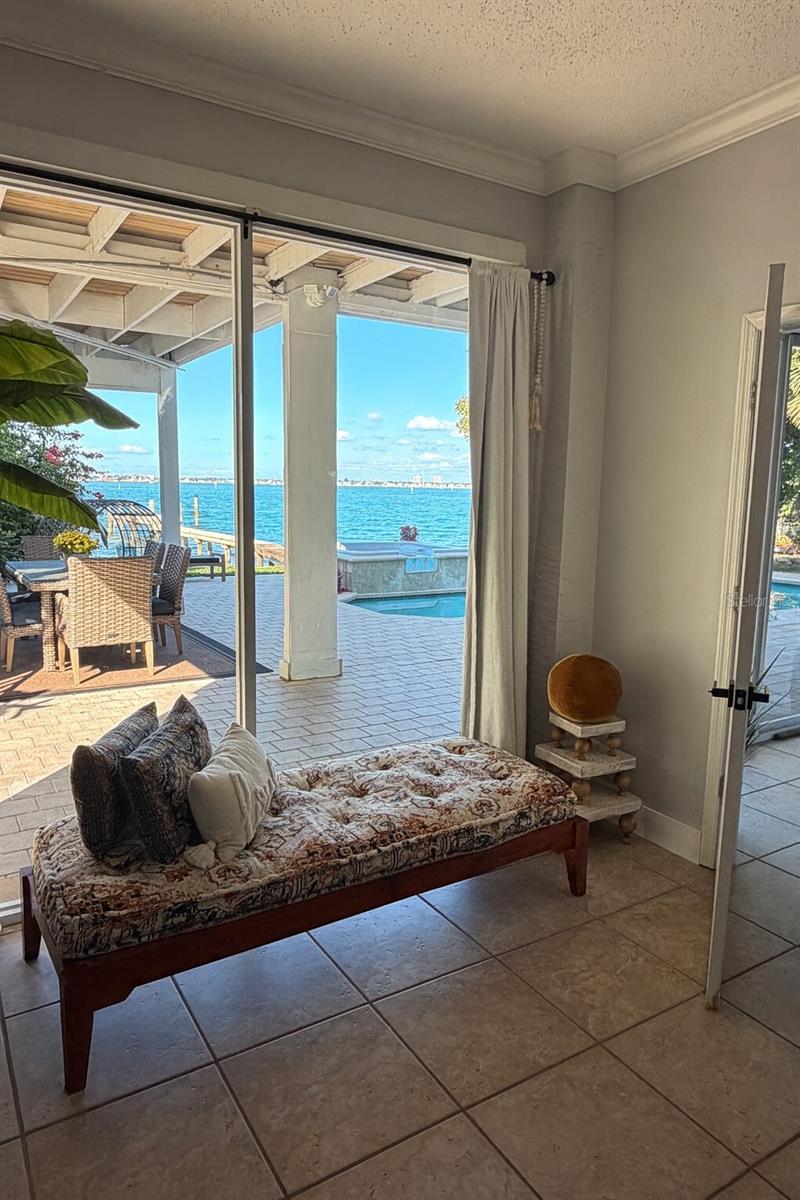 Bedroom 5 has waterfront views and pool access.