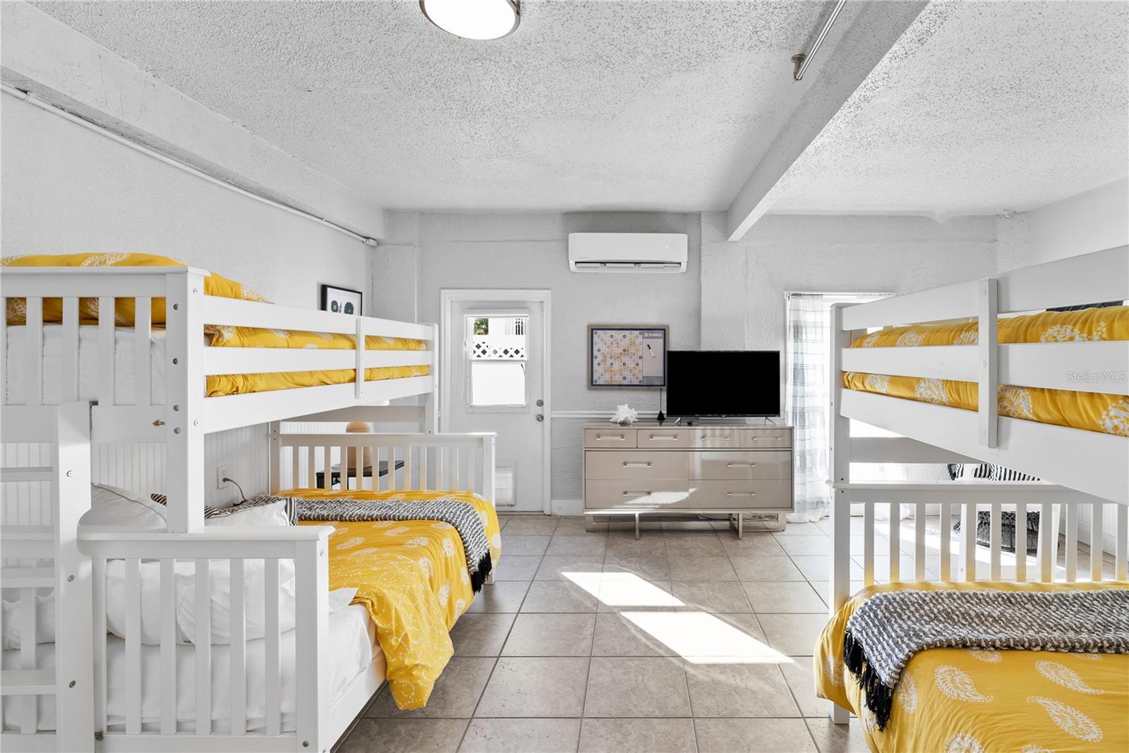 Bunk room sleeps six — perfect for guests or kids