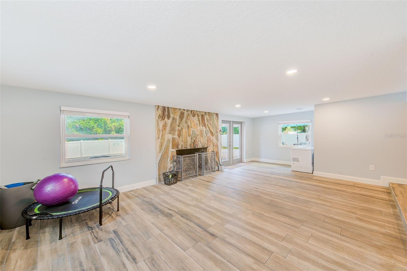 Spacious family room.  Approx. 27 x 15.  Your possibilites are endless