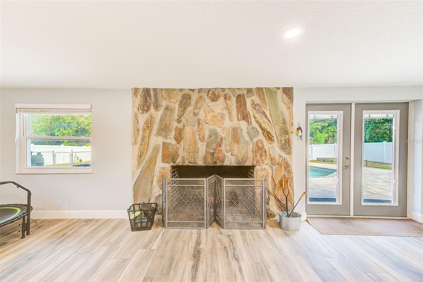 Cozy up around the stone fireplace on those chilly nights