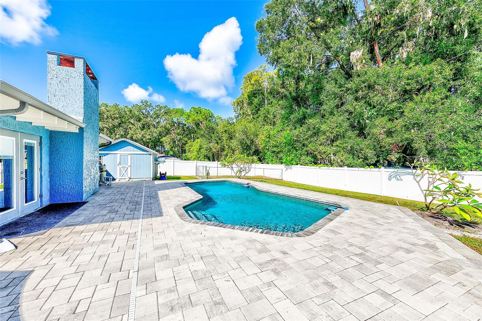 Stunning backyard oasis, with .29 acre lot with Full vinyl fencing