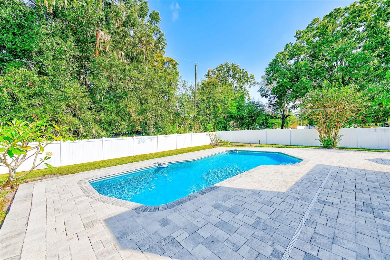 Room for plenty of family and friends to gather around a fire pit or play outdoor games, corn hole, croquet ....
