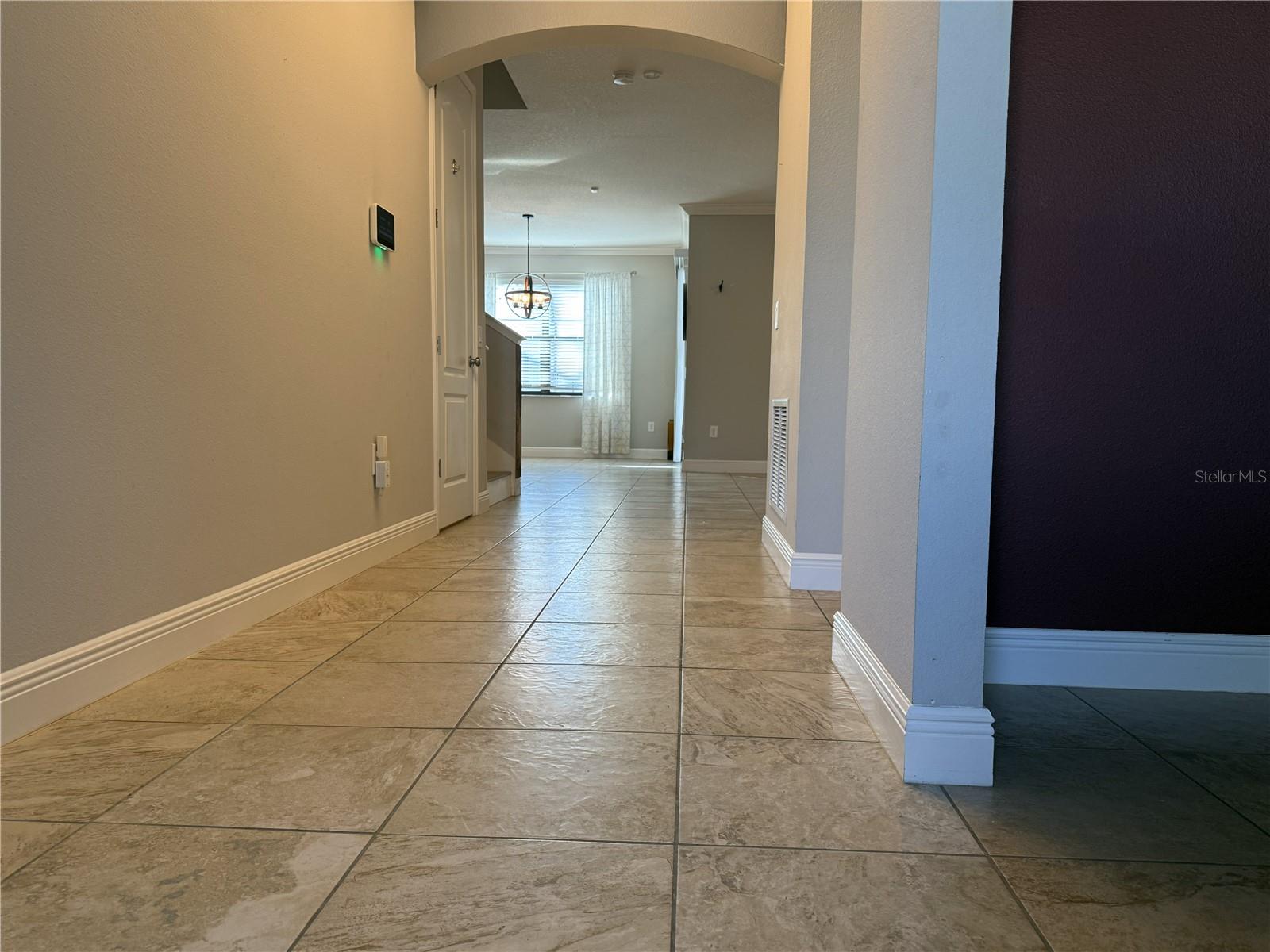 View to Gathering Room + Dining Area