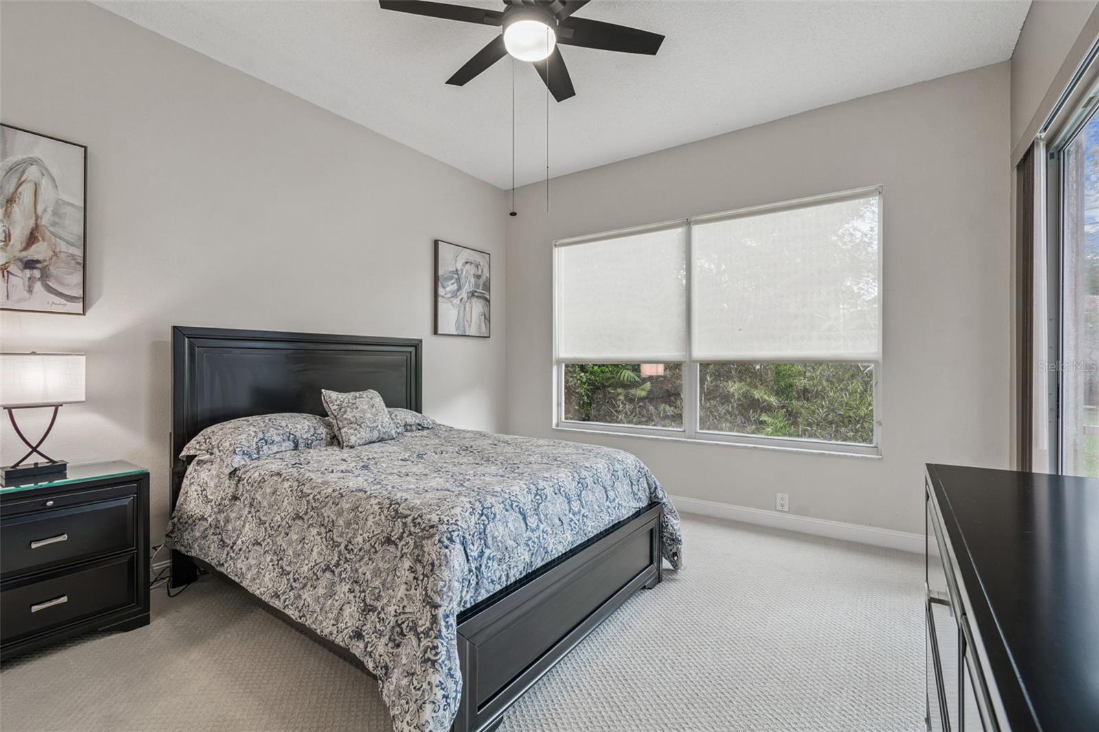 Owners bedroom suite with backyard views