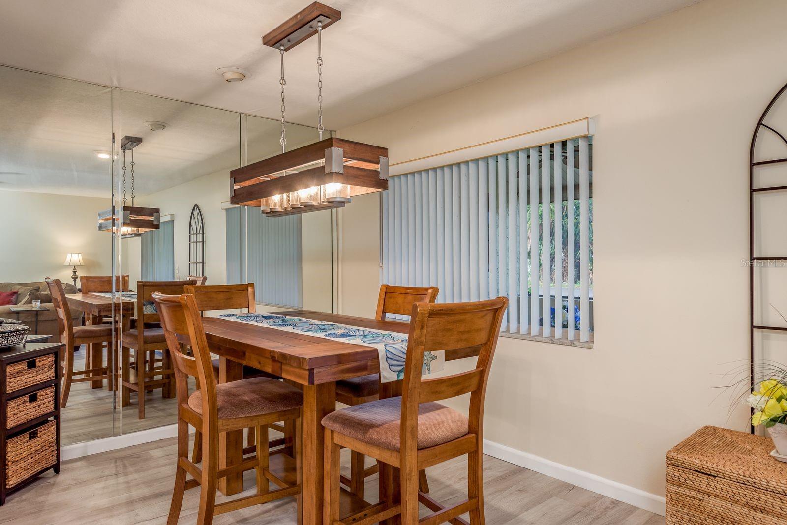 Dining room with a window that looks to the back of the condo.