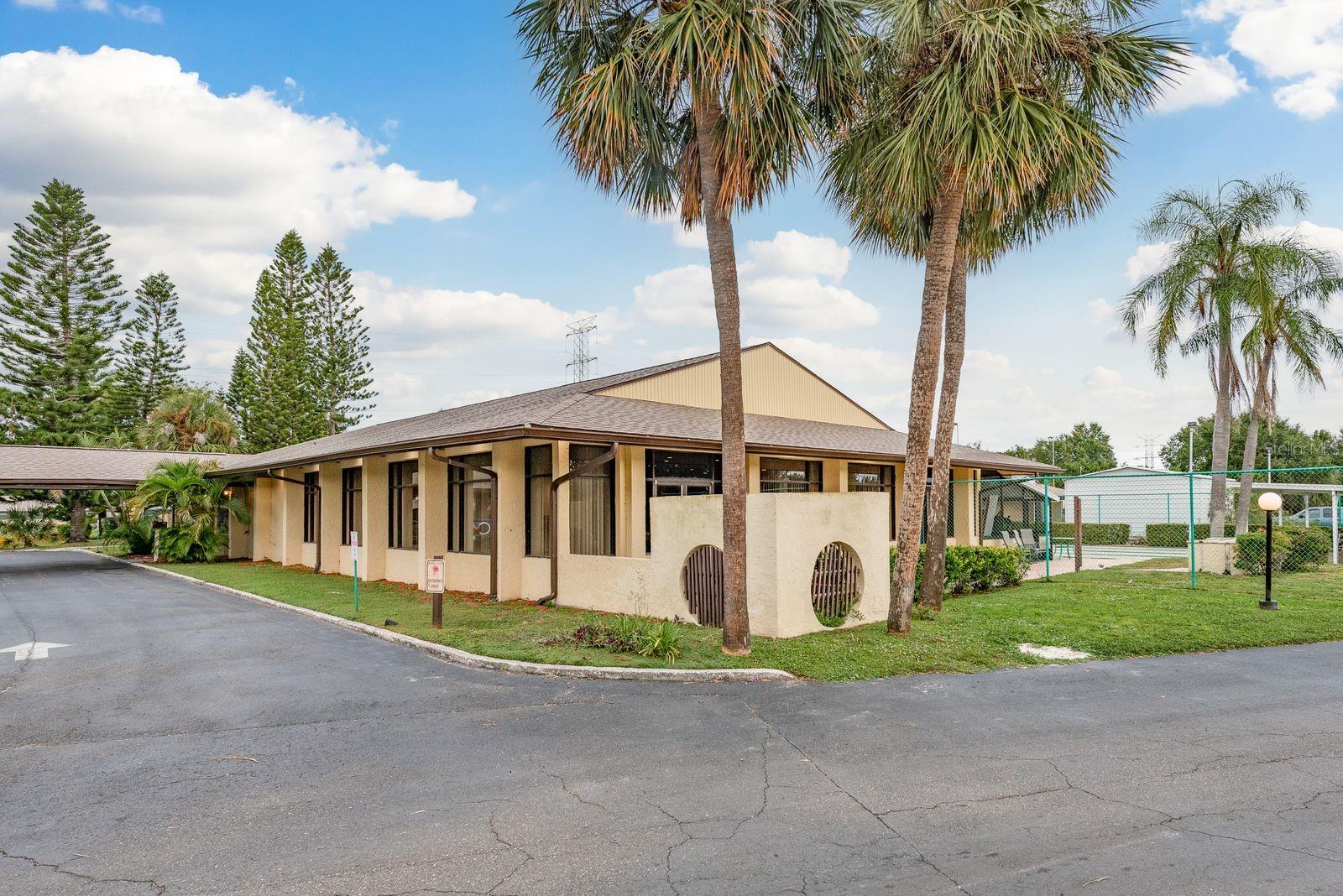 Community Clubhouse with shuffleboard courts.