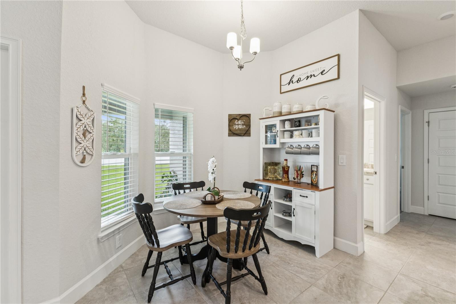 Spend mornings together in the breakfast nook with views of the backyard.