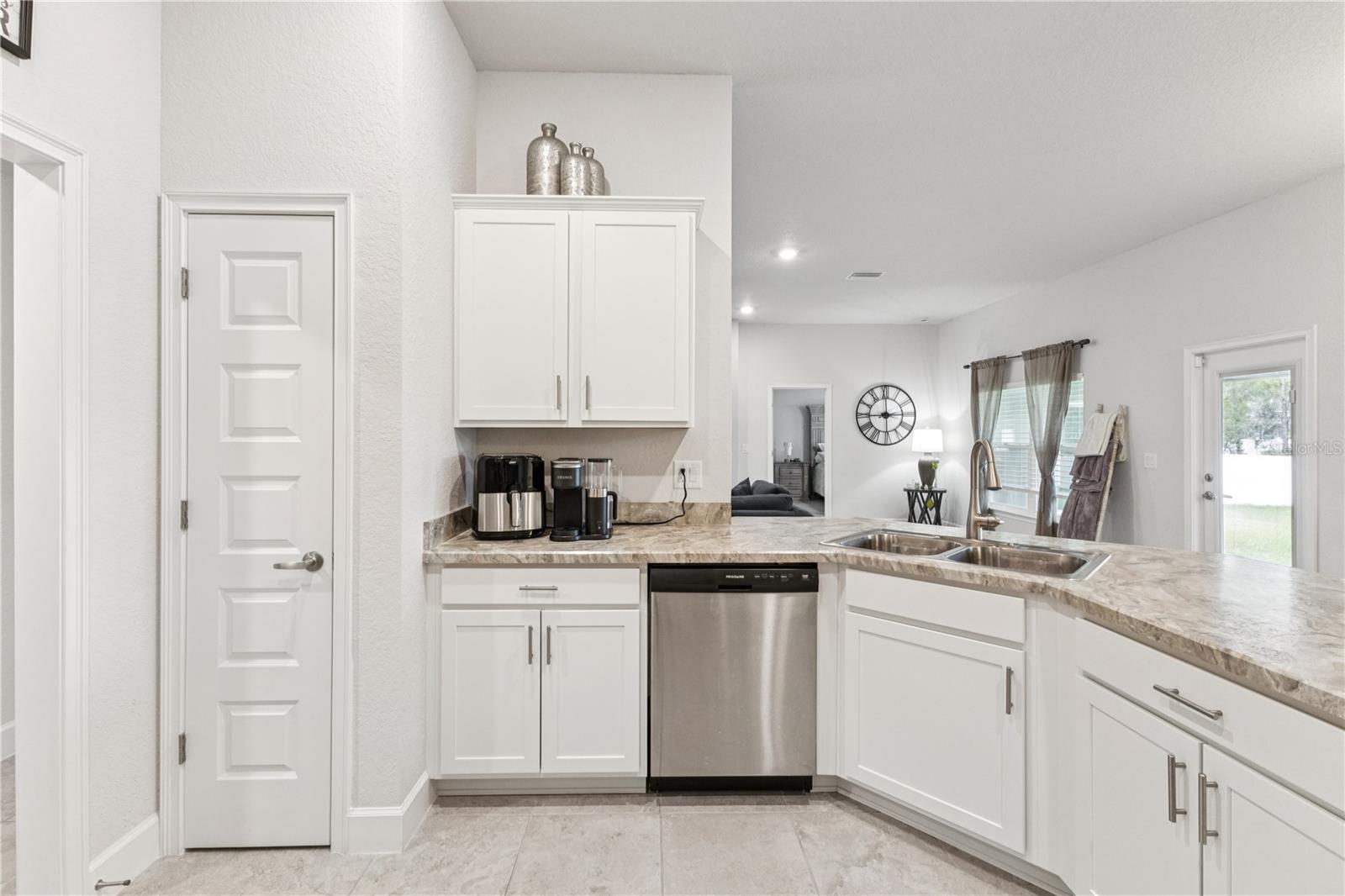 Pantry, dishwasher, and sink disposal and more.