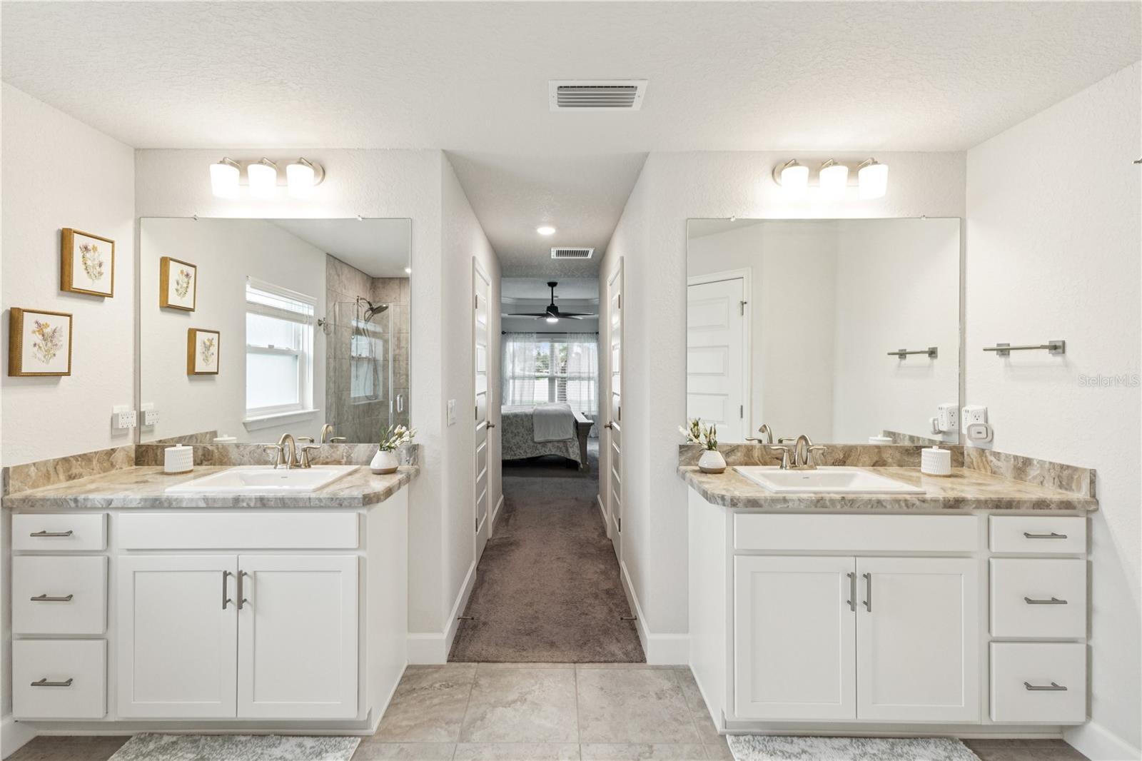 Enjoy your own space with this jack and Jill style vanity setup.