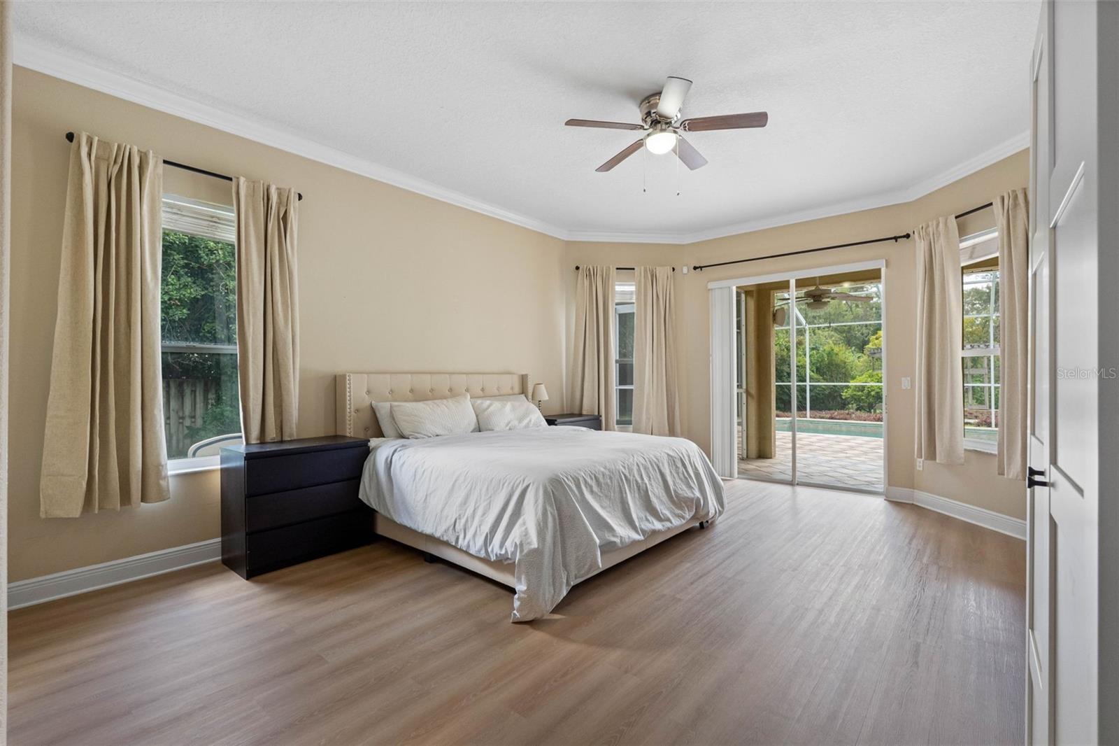 Master Bedroom with great views of the pool and conservation