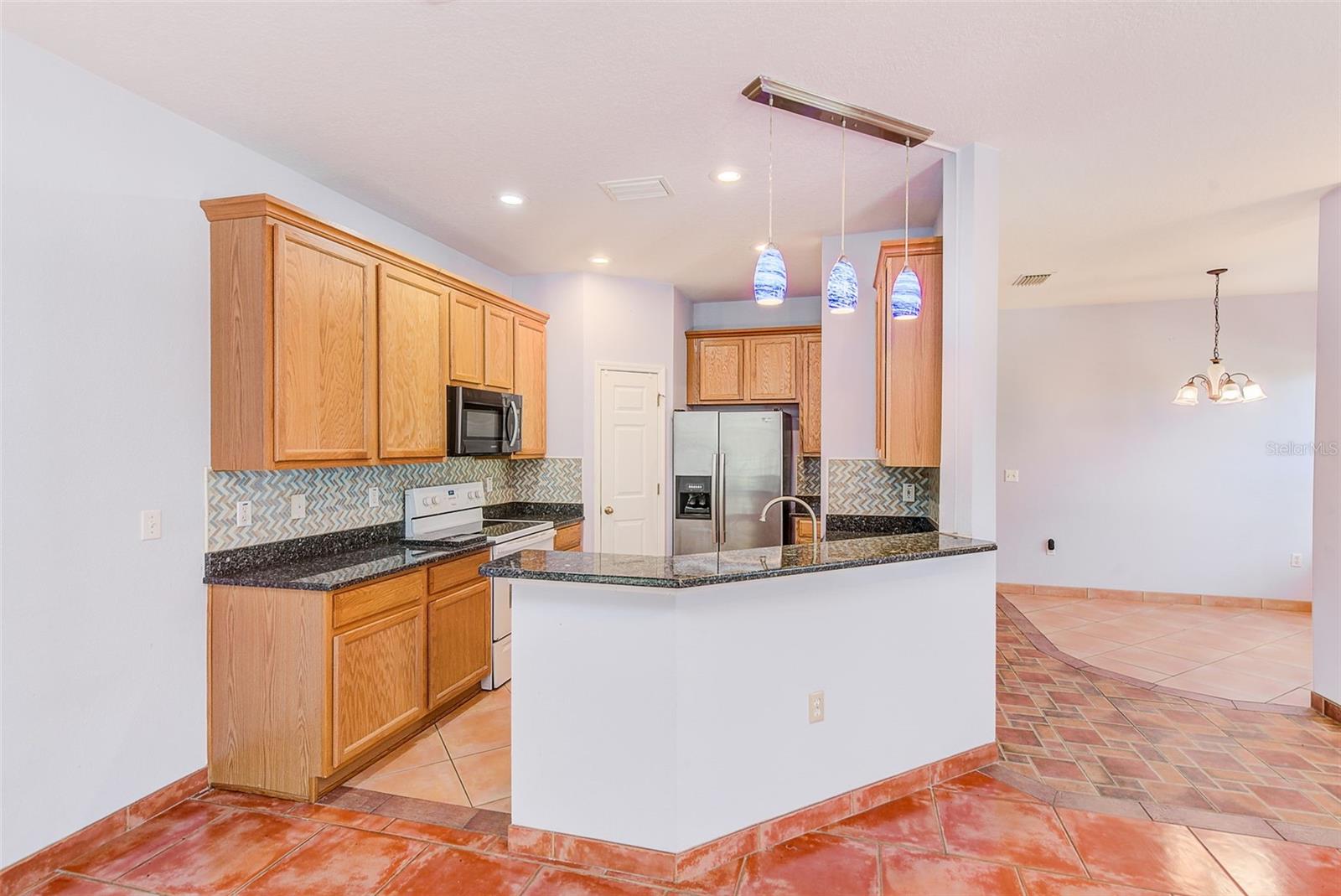 View of kitchen from living room