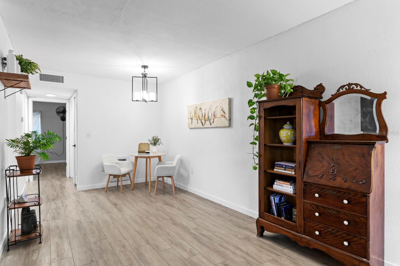 When you walk in, you can see the dining area opposite the kitchen.