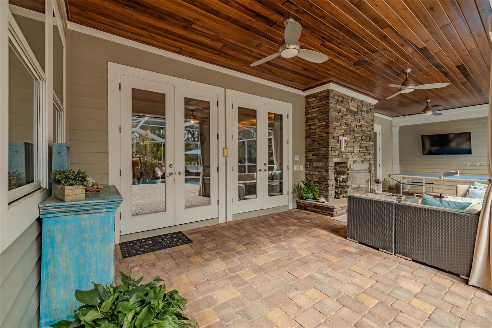 French doors connecting home to Pool area