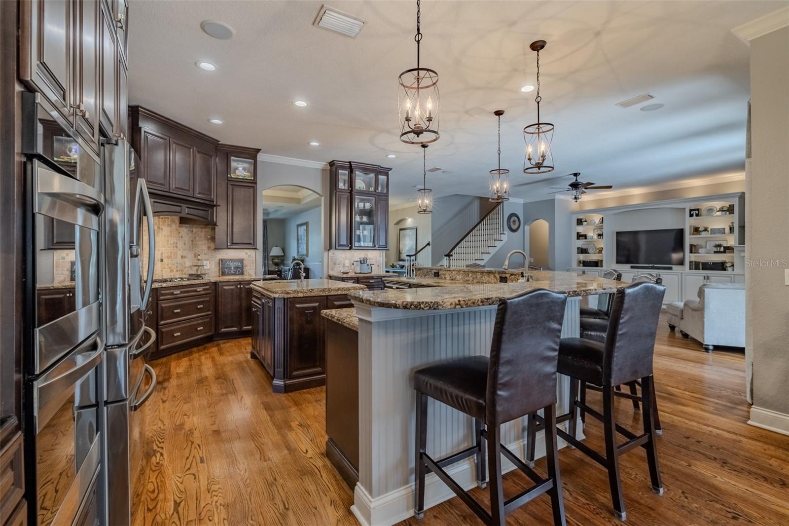 bar stools around large kitchen island