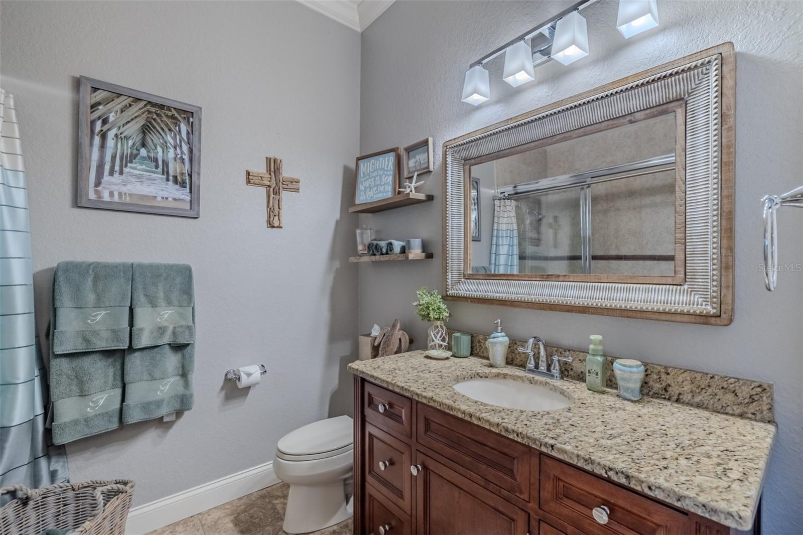 Full bath #2 by kitchen and pool