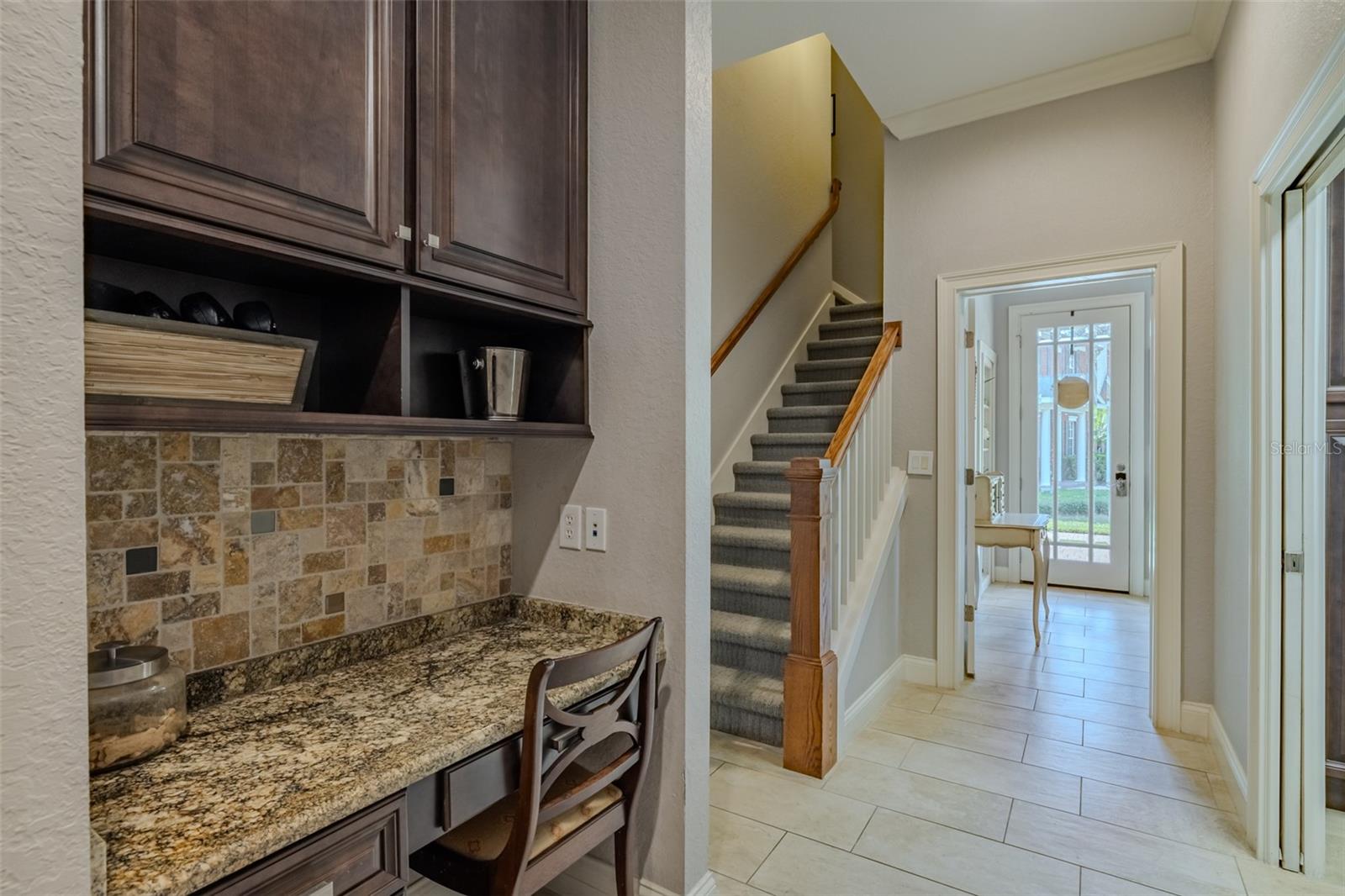 hall to laundry room and stairs to media room