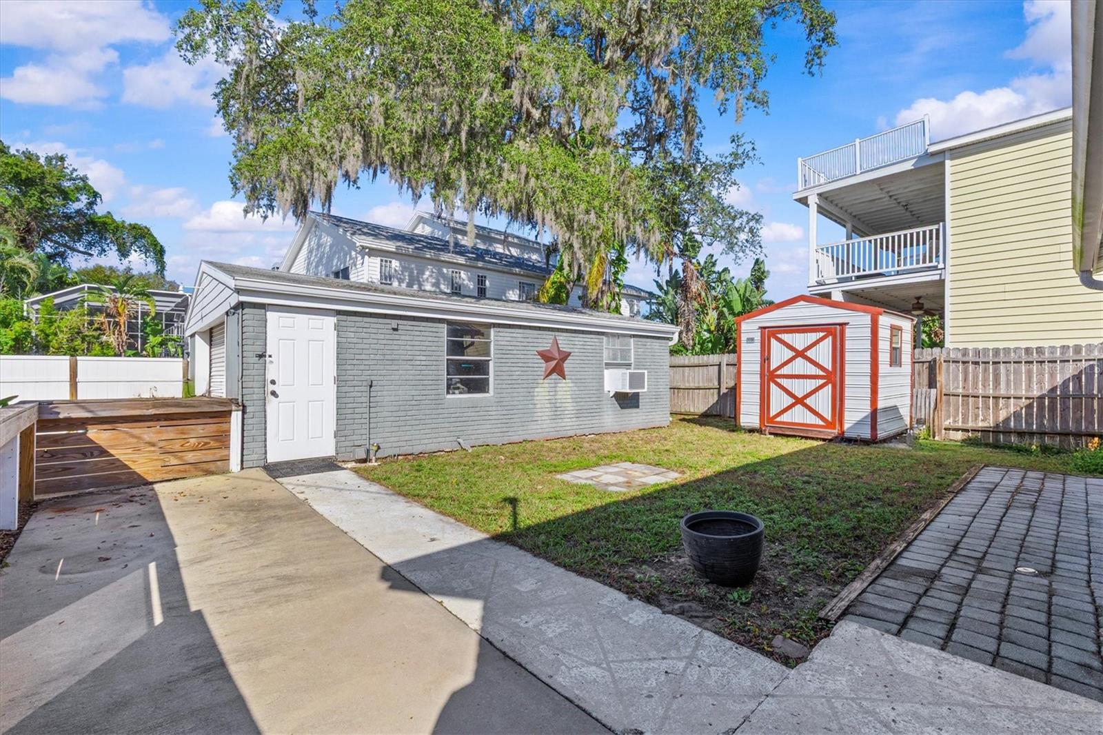 Detached oversized  2 car garage in back of property