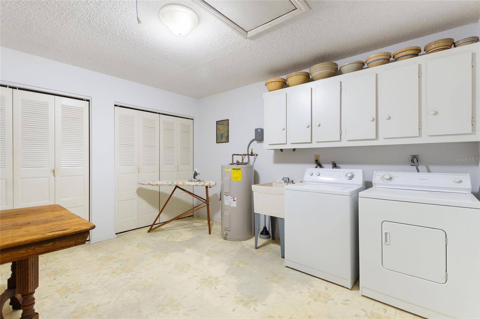 HUGE LAUNDRY ROOM!  Located just off the kitched.  Lots of storage!