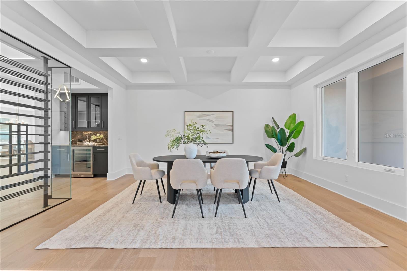 Formal dining room off entry.