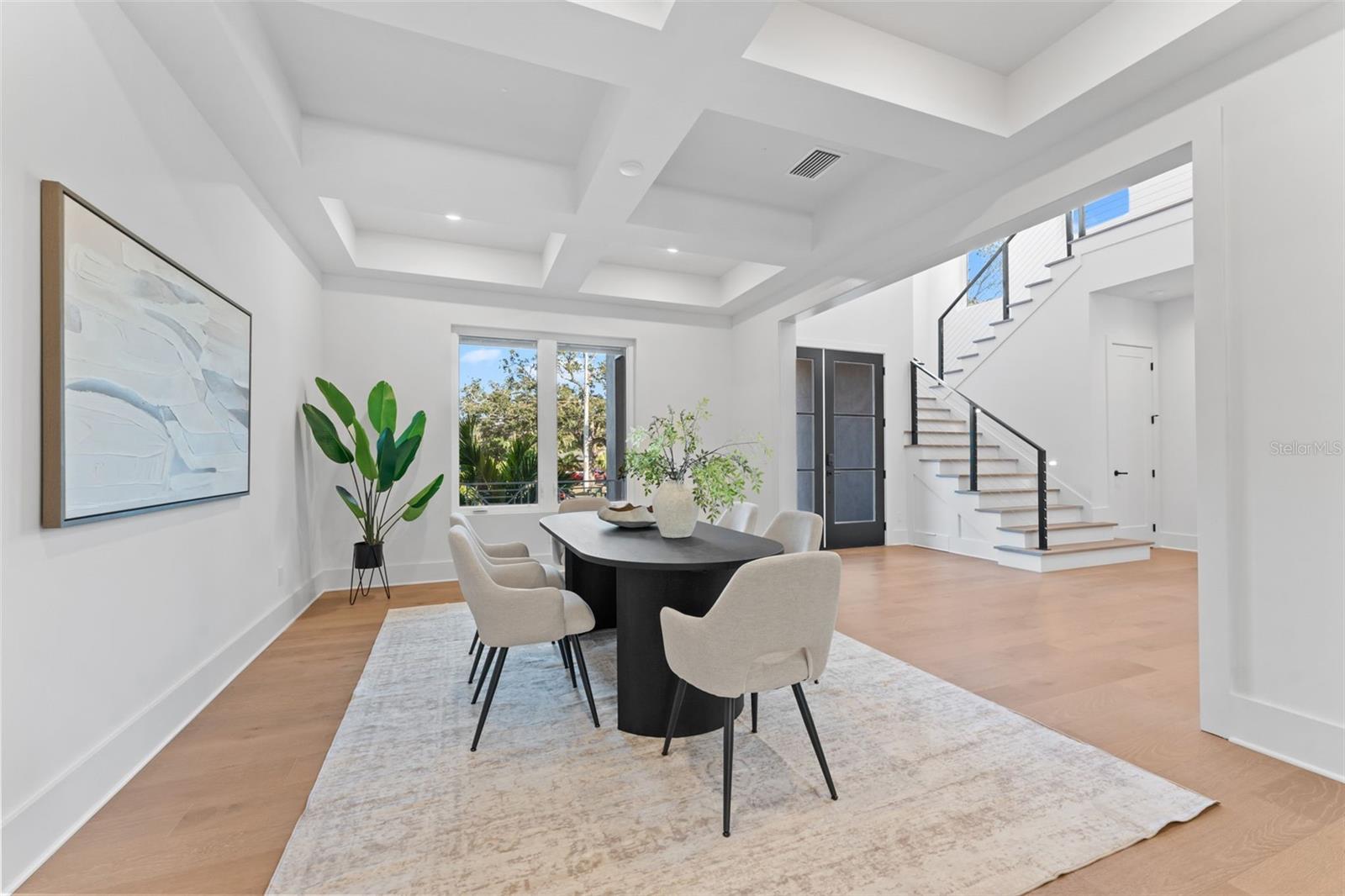 Formal dining room off entry.