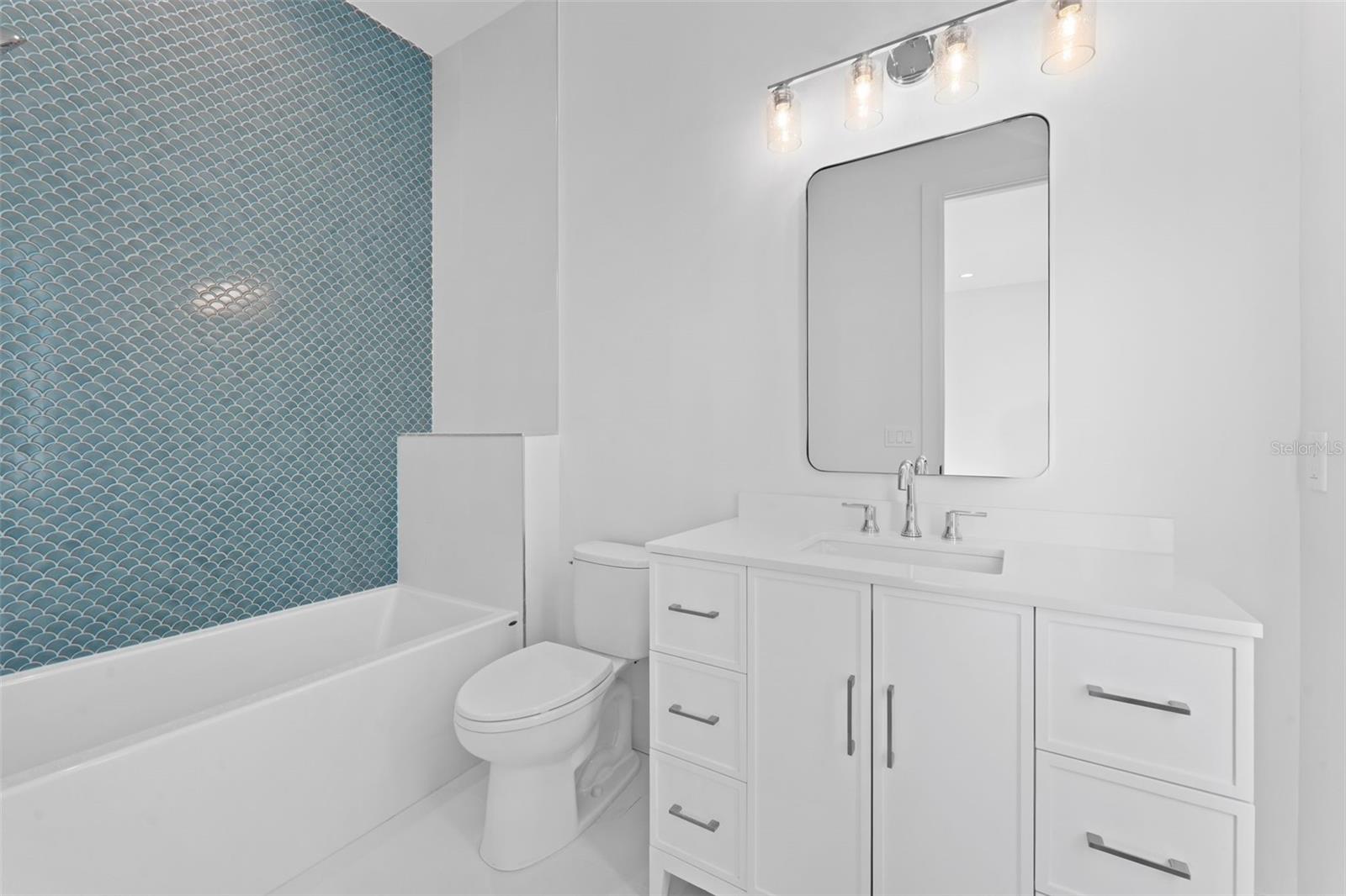 Upstairs guest bathroom 2.