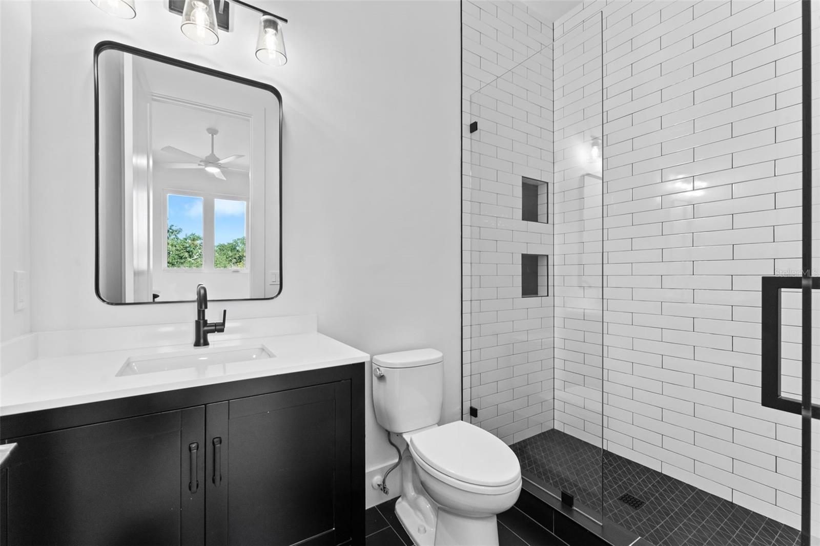 Upstairs guest bathroom 3.