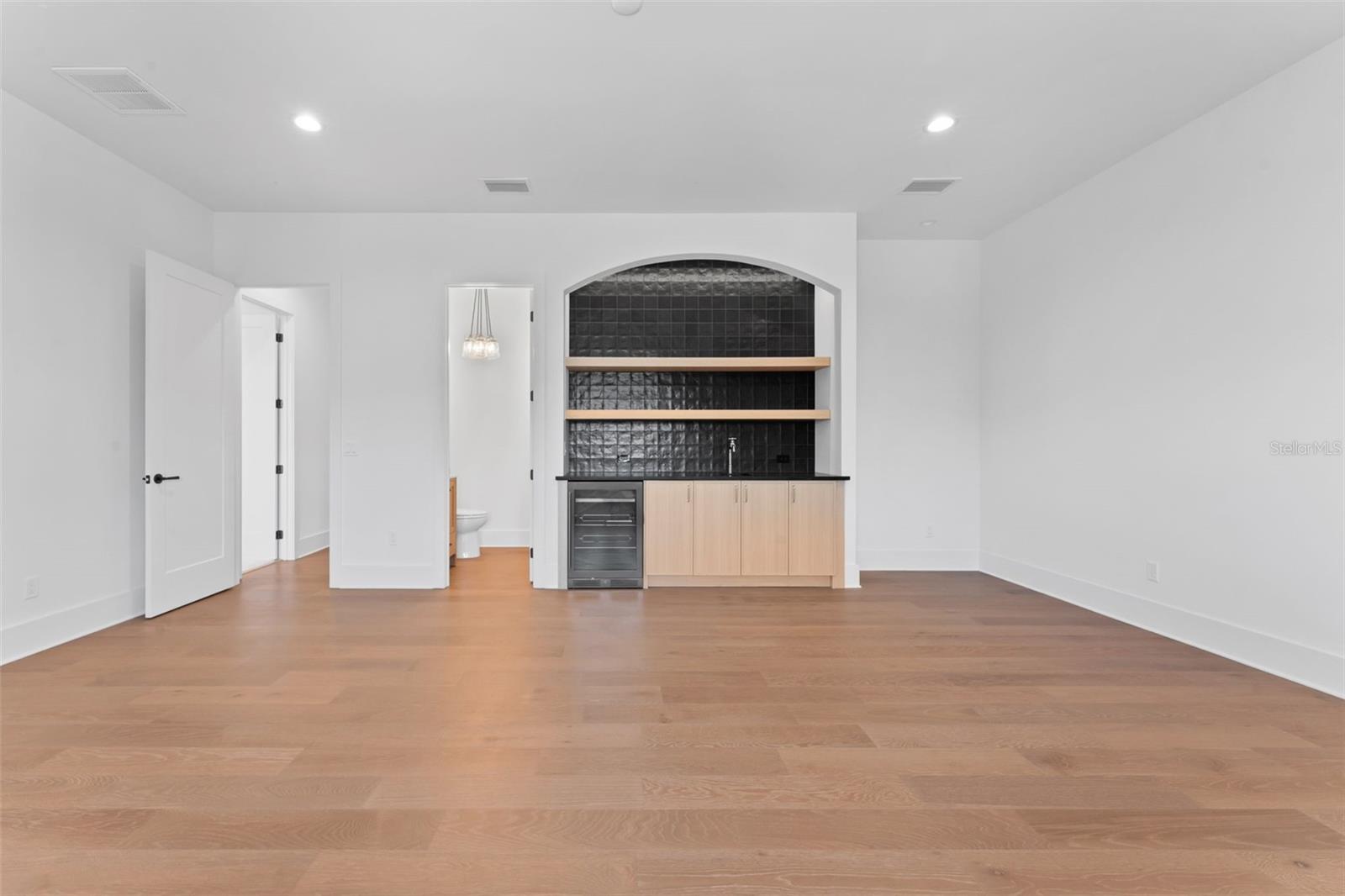 Upstairs guest bedroom 4 / media room.