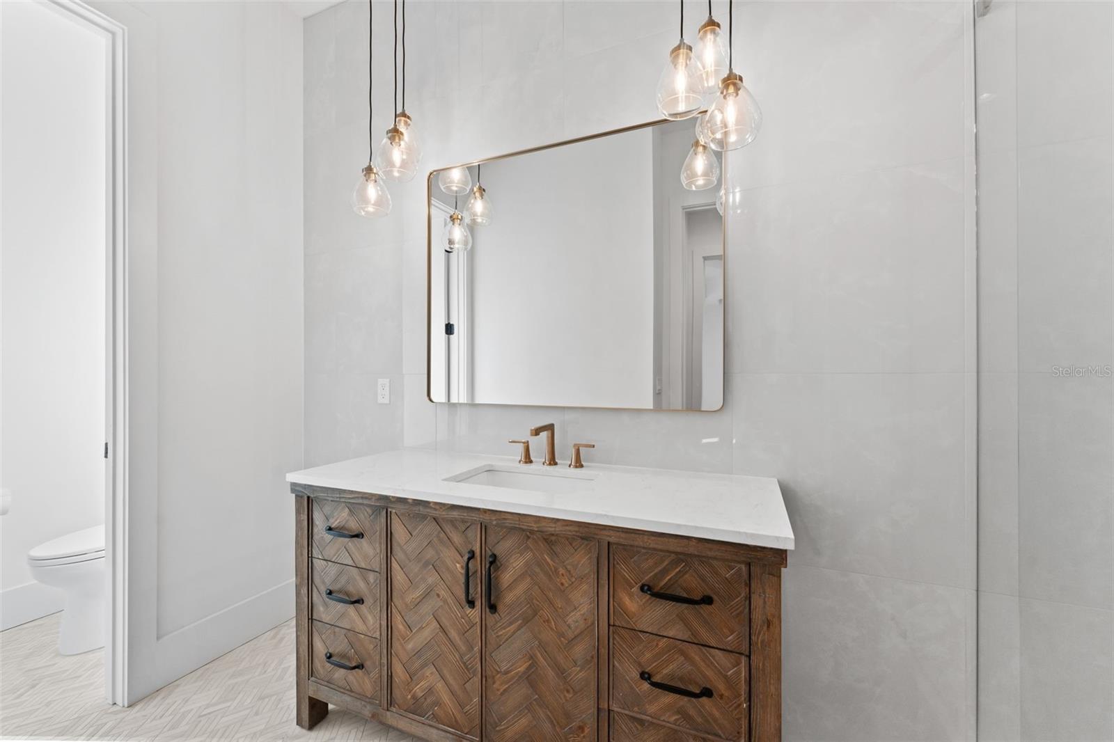 Downstairs primary full bath.