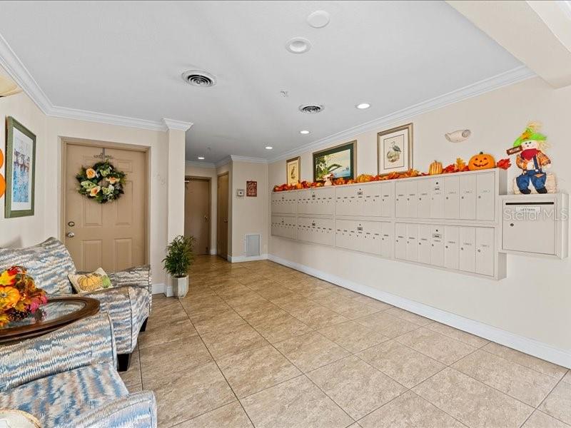Secure Syracuse Building lobby with mailboxes for the residents