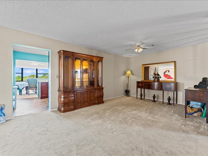 Your first views upon arriving home will draw your eyes to the large window with water views