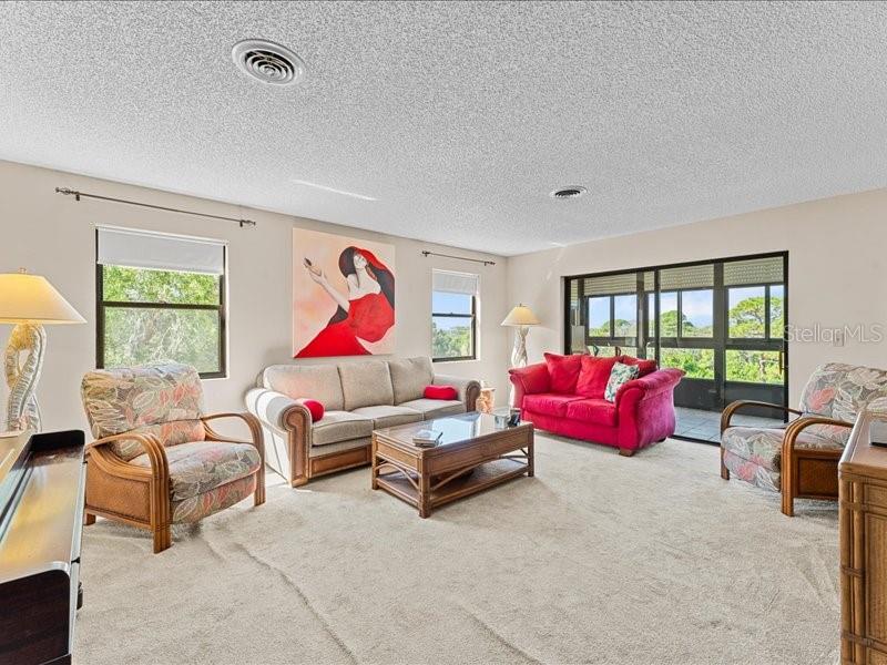 The "less formal" space has lots of natural light and great cross breezes