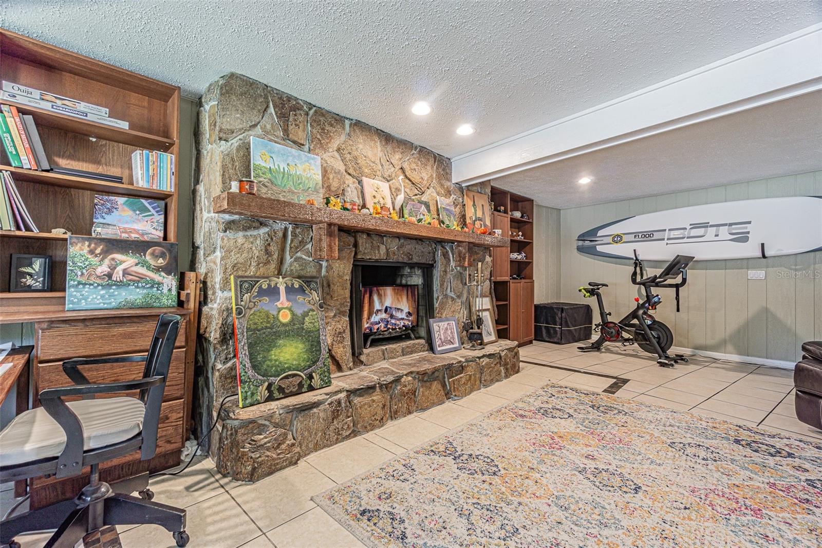 Beautiful custom stone wood burning fireplace.