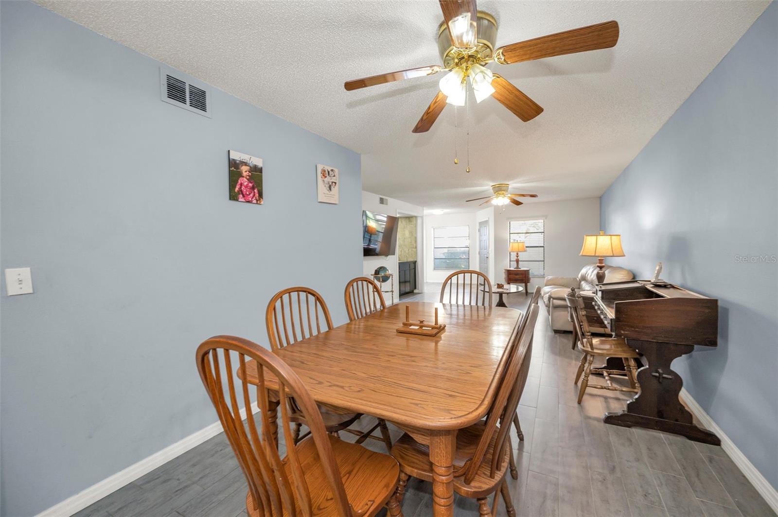 Dining room holds full size table and buffet