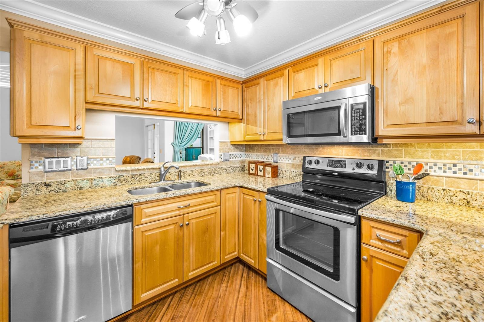 Kitchen - Granite Counter tops - Pass Through to the living /Dining Room
