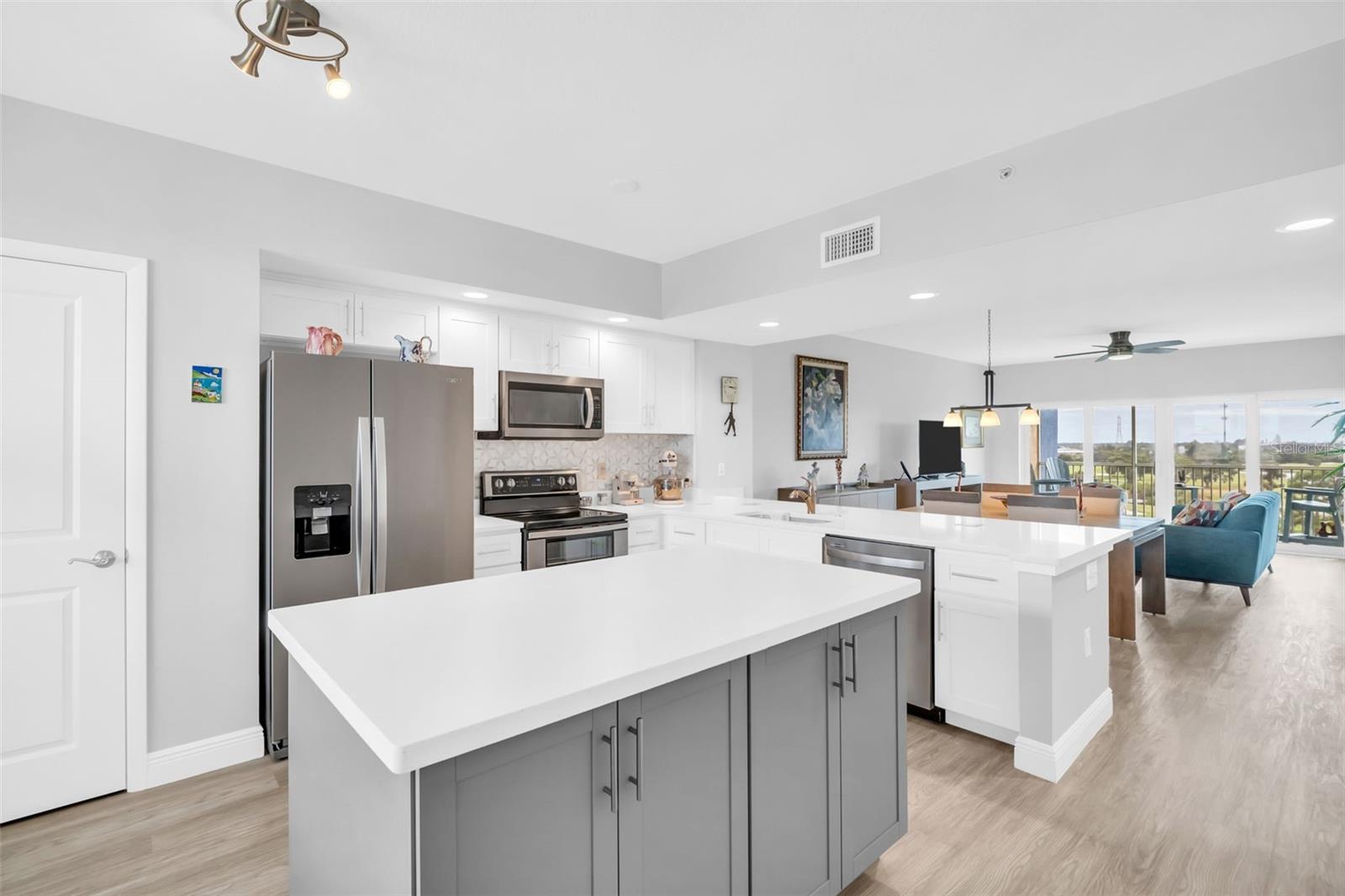Kitchen Opens to Dining and Living Room