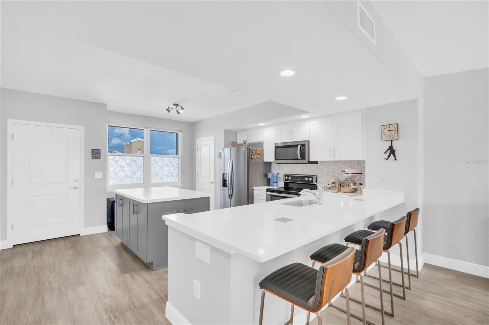 Spacious Kitchen with Bar Seating